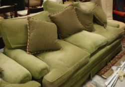 A modern upholstered three seat sofa,