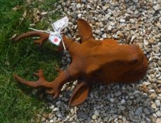 A cast iron stag's head ornament CONDITION REPORTS It has both eyes and is approx