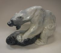 A large Copenhagen figure of a polar bear attacking a seal, No'd.