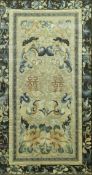 A Chinese silk needlework panel with bat and flower decoration on a light blue ground,