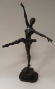 A 20th Century bronzed figurine of a ballerina en pointe