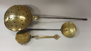 An 18th Century Dutch brass warming pan with iron handle,