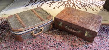 A Louis Vuitton soft suitcase in monogram print (Provenance: vendor) together with a brown