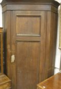 A 19th Century oak single door free standing corner cupboard