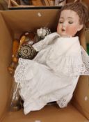 A circa 1910 bisque headed doll by Bruno Schmidt of Walterhausen with open mouth and sleep eyes,