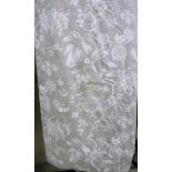 A pair of linen type beige ground with cream fruit decoration curtains, interlined,