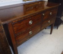 A 19th Century mahogany side table with fall front compartment as four drawers on square tapered
