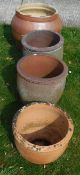 A pair of terracotta garden pots,