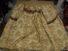 A walnut half tester with red and gold classical designed drapes and cotton bedspread with yellow