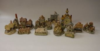 A collection of 22 various cottage ornaments by David Winter, Malcolm Cooper and Jon Herbert,