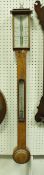 A Victorian oak cased stick barometer with ivorine panels