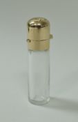 An 18 carat gold and crystal scent bottle