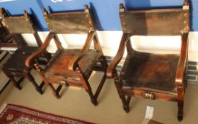 A set of 8 circa 1900 continental oak framed dining chairs in the Spanish taste,