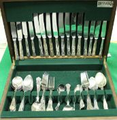 A modern mahogany cased canteen of assorted stainless steel and silver plated Kings pattern cutlery
