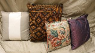 Four boxes and a bag of assorted cushions