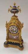 A 19th Century gilt brass cased mantel clock the eight day movement by Japy Freres of Paris the