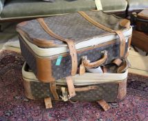 A Louis Vuitton soft suitcase with monogram print and leather fittings( Provenance:Mrs.