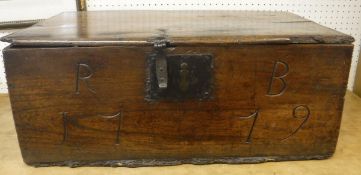 An 18th Century elm lidded box the front panel carved "RB 1779" CONDITION REPORTS