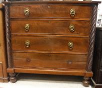 A Victorian mahogany chest of drawers, the plain top above four long drawers,