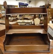 A late Victorian mahogany hanging waterfall book shelf with removable drawer