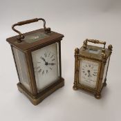 A French brass carriage clock together with a further brass carriage clock,