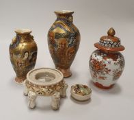 A Meiji period Japanese Satsuma ware baluster shaped vase decorated with numerous deities and a