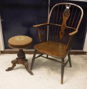 A mid 19th Century Thames Valley beech and elm wheel and stick back elbow chair on turned legs