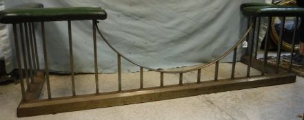 A circa 1900 steel railed club fender with green leather upholstered seats CONDITION