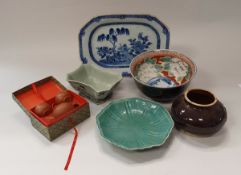 A Chinese Imari bowl with famille noire floral decorated exterior,