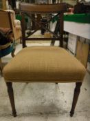 A set of three Edwardian mahogany and satinwood banded dining chairs,