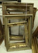A collection of ten giltwood and gesso and plain wooden picture frames of varying sizes