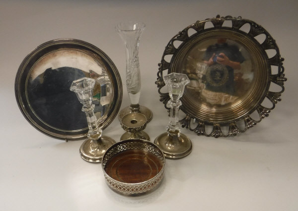 A collection of silver and silver plated items comprising a pair of silver mounted cut glass