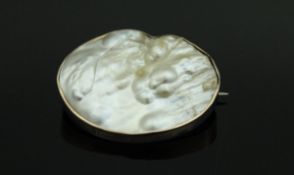 A 9 carat gold blister pearl brooch of oval form the mount inscribed "March 7th 1918"