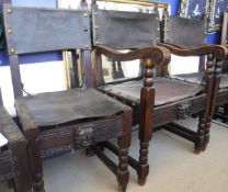 A set of eight circa 1900 Continental oak framed dining chairs in the Spanish taste,
