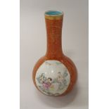 A Chinese republican period gourd shaped vase (1912-1949) oxide red ground with overglaze dragon