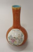 A Chinese republican period gourd shaped vase (1912-1949) oxide red ground with overglaze dragon