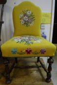 An early 20th Century mahogany framed hall chair with yellow gros point and petit point floral