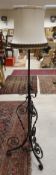 A Victorian painted wrought iron telescopic standard lamp