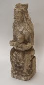 A carved stone figure of The Madonna and Child in the Medieval Continental style