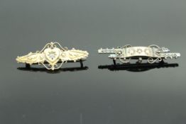 Two Victorian gold and diamond set bar brooches 5.