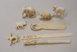 A quantity of early 20th Century ivory wares to include Japanese ivory shoe horn,