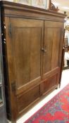 A 19th Century Provincial oak hall cupboard,