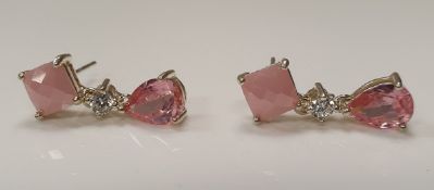 A pair of gold mounted pink quartz and crystal earrings