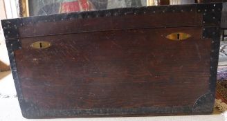 A circa 1900 stained pine iron bound and zinc-lined trunk CONDITION REPORTS There is