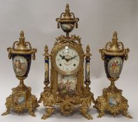 A modern brass cased clock garniture,