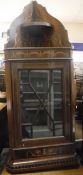 An Edwardian rosewood and marquetry inlaid single glazed door hanging corner cabinet,