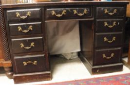 A late Victorian mahogany double-pedestal desk