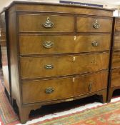 A 19th Century mahogany and satinwood strung bow fronted chest of two short over three long drawers