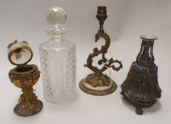 A cut glass decanter and stopper, pair of Rococo style table lamps,