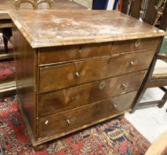 An early 18th Century walnut chest of two short over three long drawers,